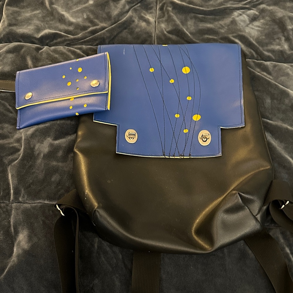 Holly Aiken bookbag and matching wristlet in blue and yellow